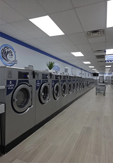 Modern washing machine used for deep cleaning clothes in professional laundry service in New Jersey