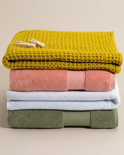Colored towels professional laundry cleaning service with safe washing and fabric protection