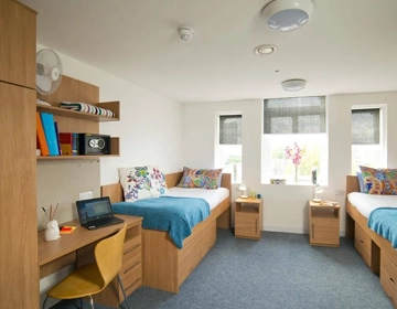 Community college laundry service for student housing linens, bedding, bath towels, and fabrics