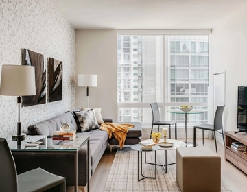 Corporate rental laundry service for business stays with clean linens, towels, and bedding