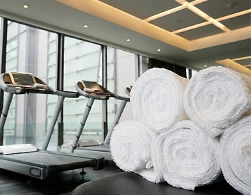 Gym and fitness studio laundry service for towels, workout linens, cleaning cloths, and fabrics