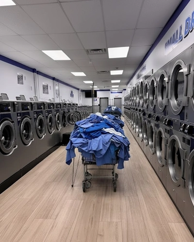 Large volume laundry washing service in NJ for care homes with linens, towels, and bedding
