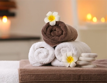 Spa towel laundry service for fresh hygienic towels, robes, facial sheets, and spa linens